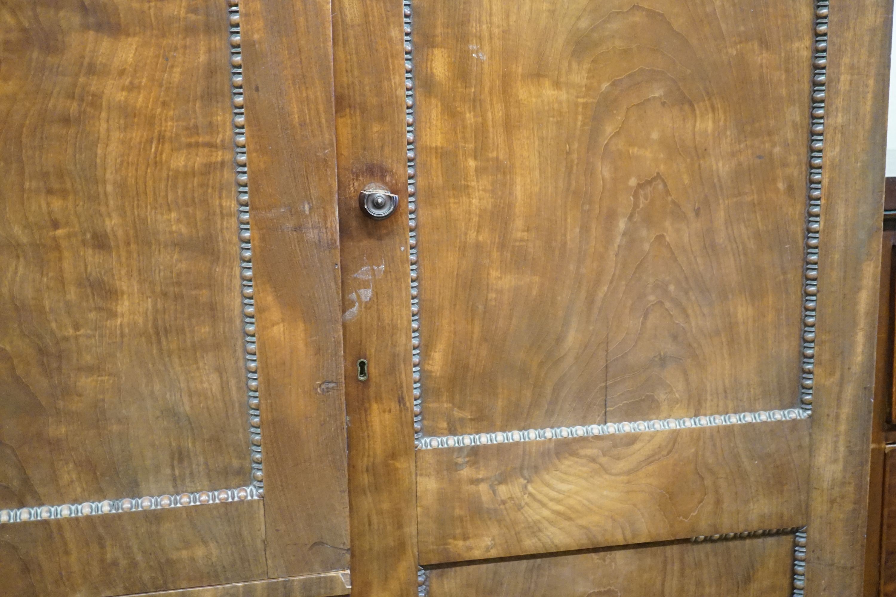 A George IV flamed mahogany break-front wardrobe, length 244cm, depth 60cm, height 195cm